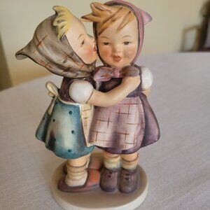 Goebel Hummel Figurine: Telling Her Secret #196/0, TMK 2, FB, Circa 1958-1959.